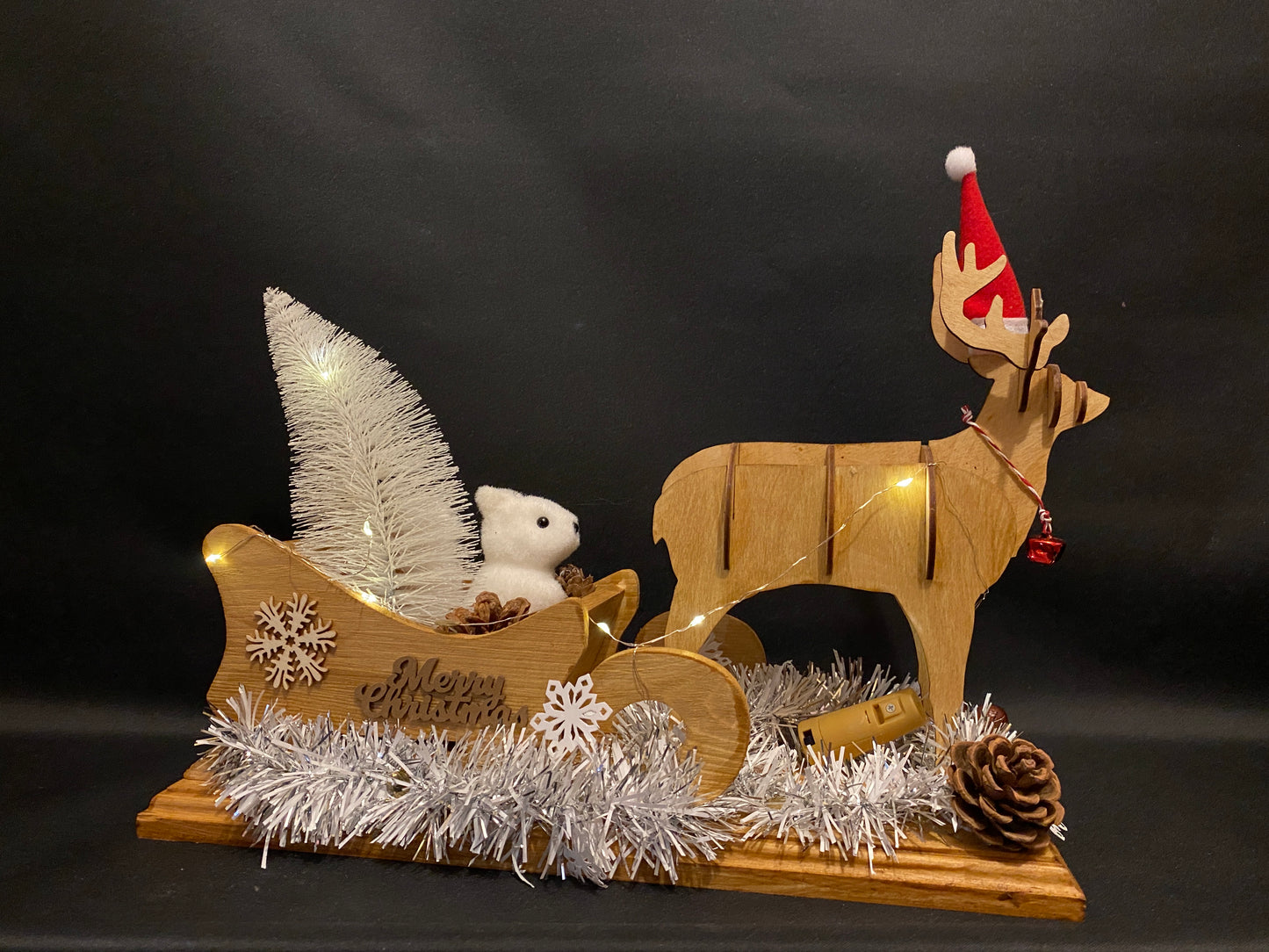 Wooden reindeer and sledge