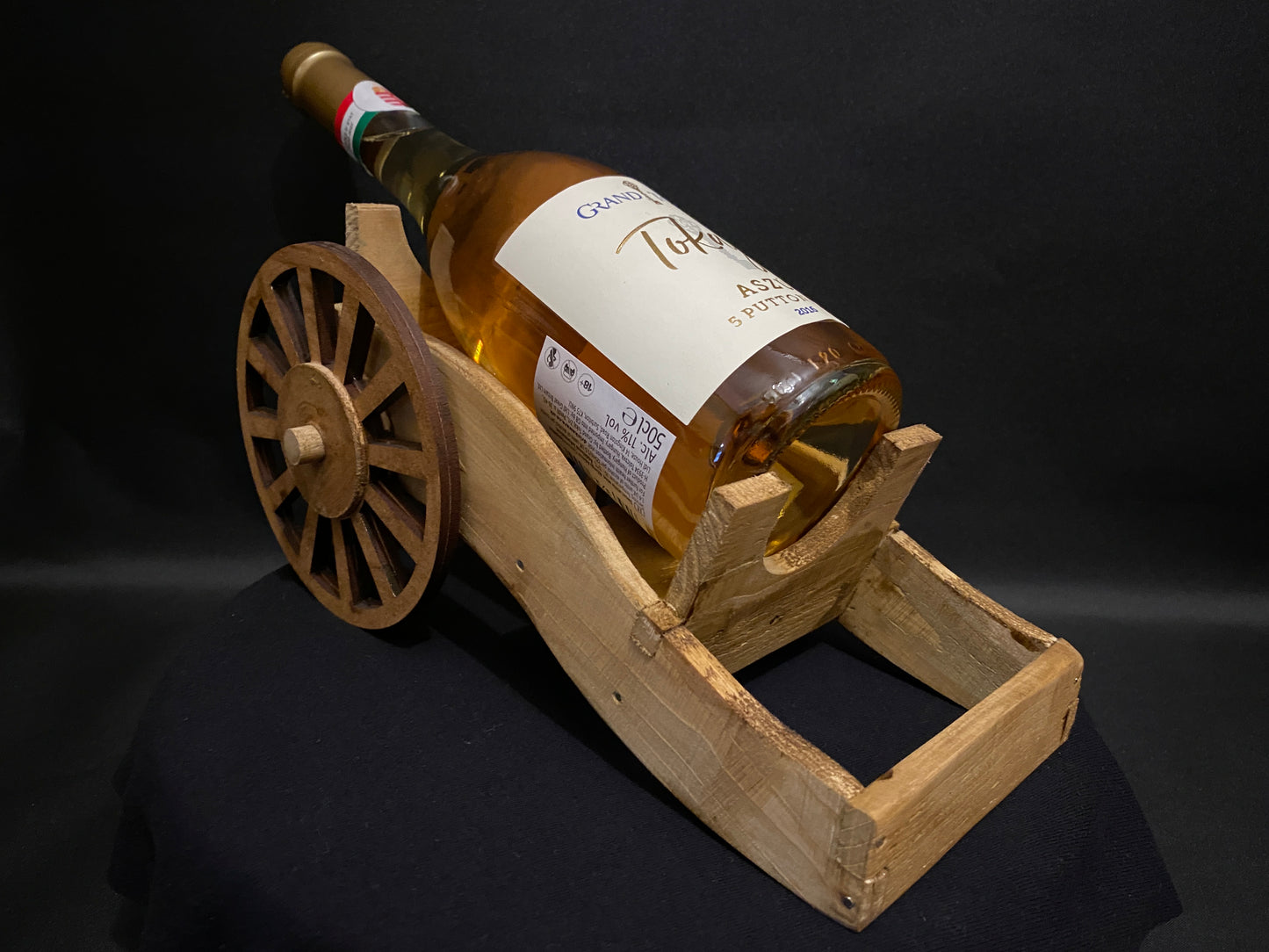 Wooden cannon shaped bottle holder